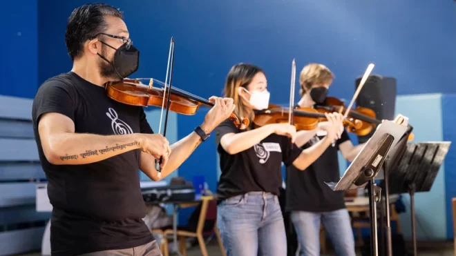 STREET SYMPHONY PLAYS IN HARMONY WITH SKID ROW’S ‘SACRED SPACES’